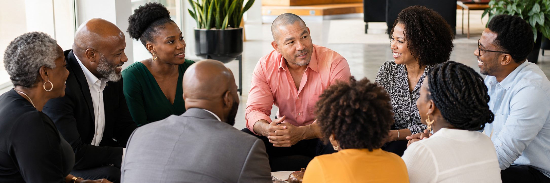 Black American Party members in an informal lounge discussion