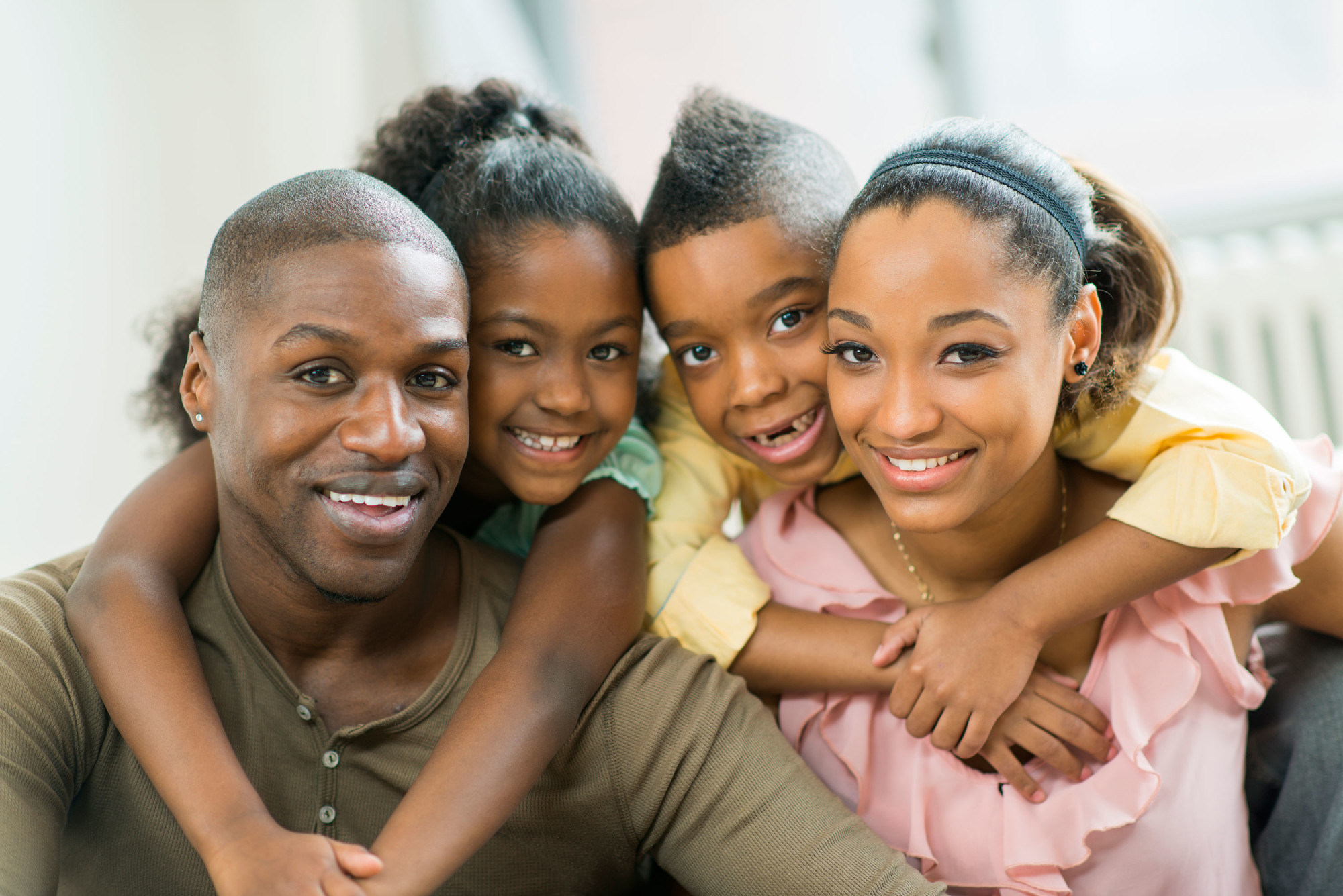 Black American family representing the Black American Party vision for Black America